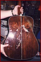 Acoustic guitar broken back repair